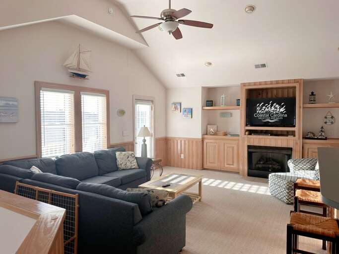 KDH472: Sebastian by the Sea | TL Living Area - Deck Access (Fireplace not for guest use.)