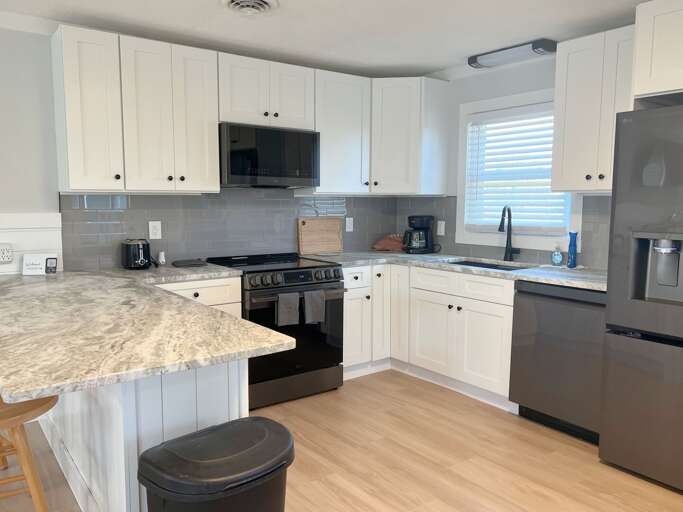 SNH419: South Nags Head 419 | Kitchen Area - Island Seating for 2, Deck Access