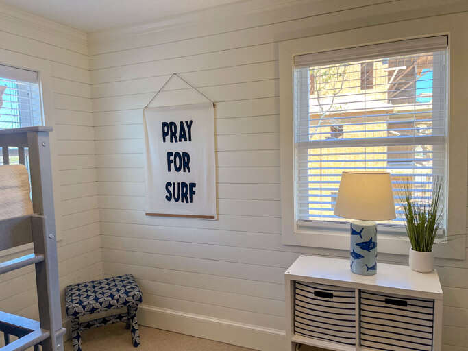 With room for everyone, enjoy this bunk room with Jack and Jill bath, a pool view and games for kids or adults of all ages. With room for everyone, enjoy this bunk room with Jack and Jill bath, a pool view and games for kids or adults of all ages.