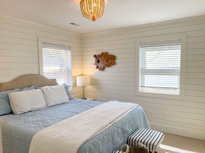 This large comfy king bed and private bath await you.