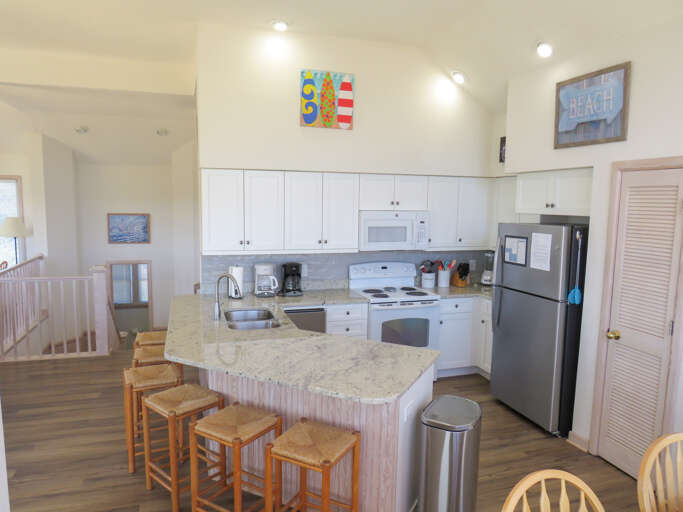 Stainless appliances, beautiful granite and bright windows this kitchen has it all.