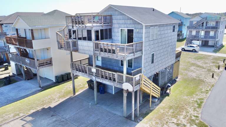 Beach House With Multiple Balconies And Raised Foundation
