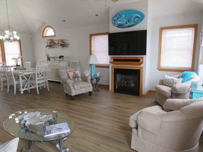 Living Room Interior With Fireplace And Dining Area
