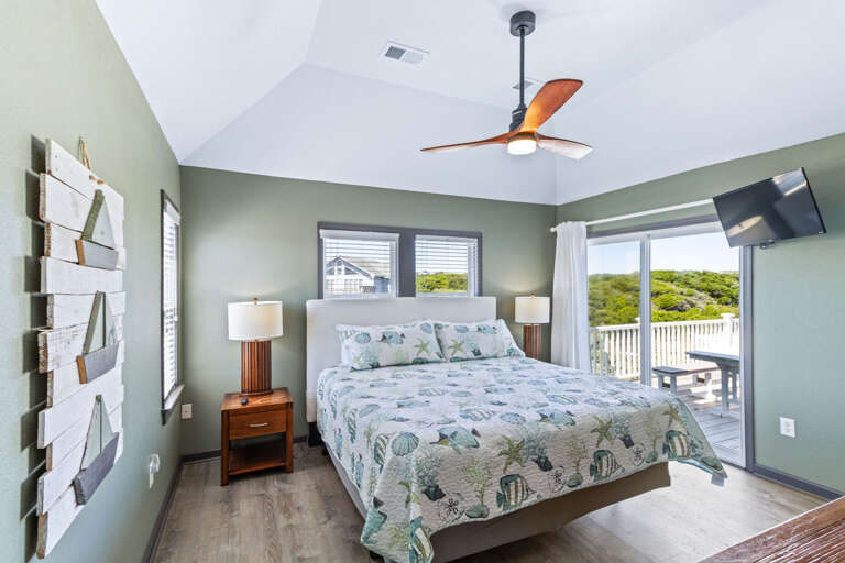 With deck access, large ceiling fan, and a private bath what more could you ask for from a King Bedroom.