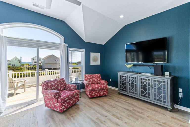 Perfect for unwinding the coastal view, large leather sectional, Smart TV with swivel accent chairs are just a few of the many reasons to cozy up with the family.