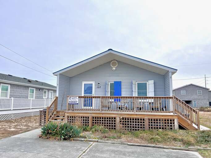 Blue Single-story House With Deck