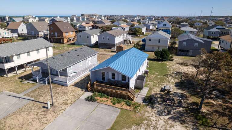 Aerial View Of Residential Area With Houses And Roads