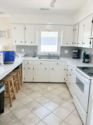 Vacation Rental Kitchen Interior With Bar Stools