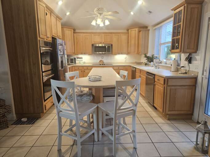 Kitchen Contrived Cleverly, Chairs Clustered Charmingly