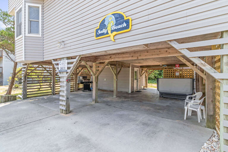 Stilted Beach House Exterior With Parking Area