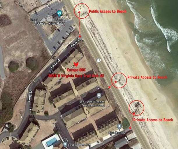 Aerial View Of A Coastal Area With Marked Beach Access Points