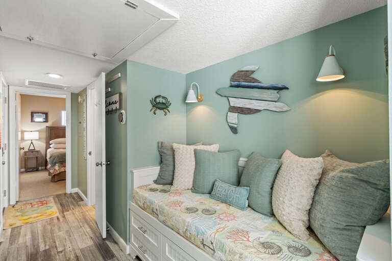 This cozy nook could be used as a reading area, secondary living space or sleeping quarters for your little one.