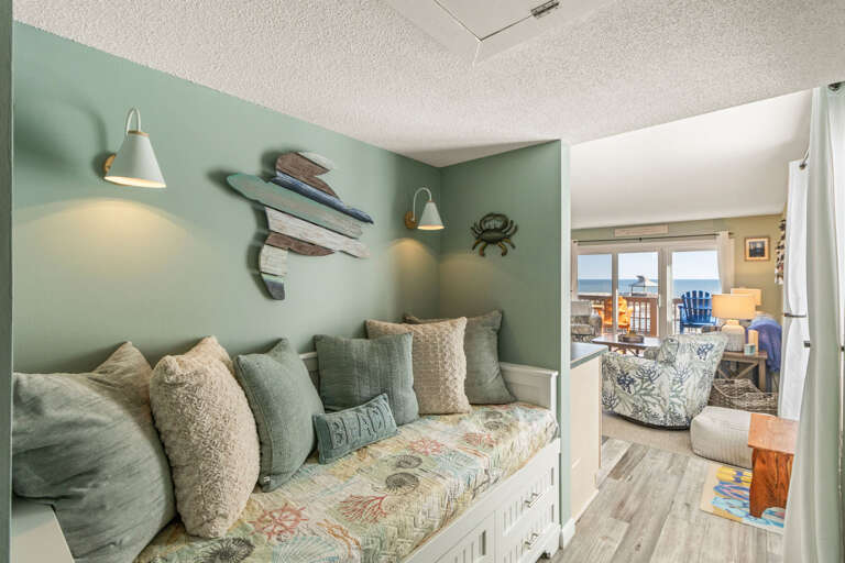 This cozy nook could be used as a reading area, secondary living space or sleeping quarters for your little one.