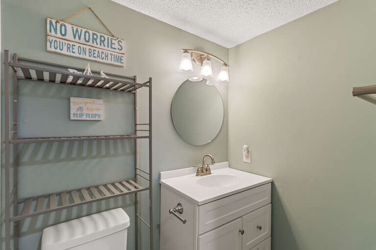 The hall bathroom is well appointed and a bright space to freshen up.