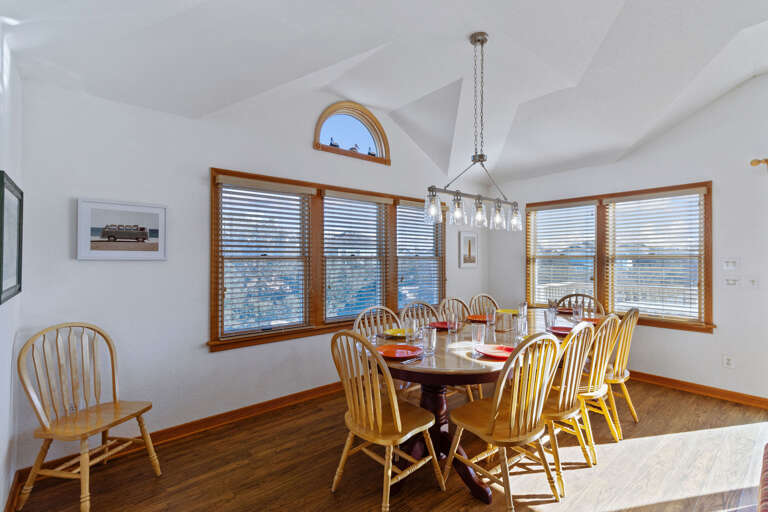 Bright Breakfast Nook, Wooden Chairs, Sunny Windows