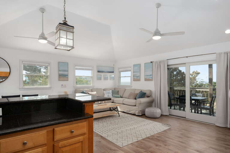 Well-appointed kitchen featuring granite countertops, upgraded appliances, and a breakfast bar, ideal for preparing home-cooked meals. 
