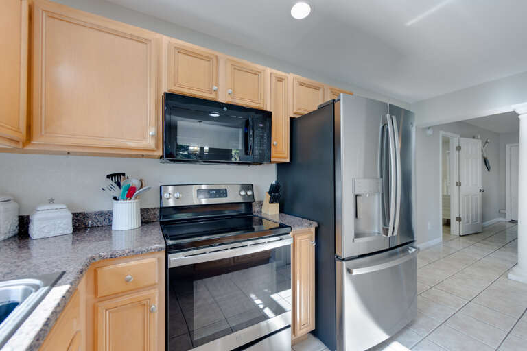 Cozy kitchen area with essential cookware