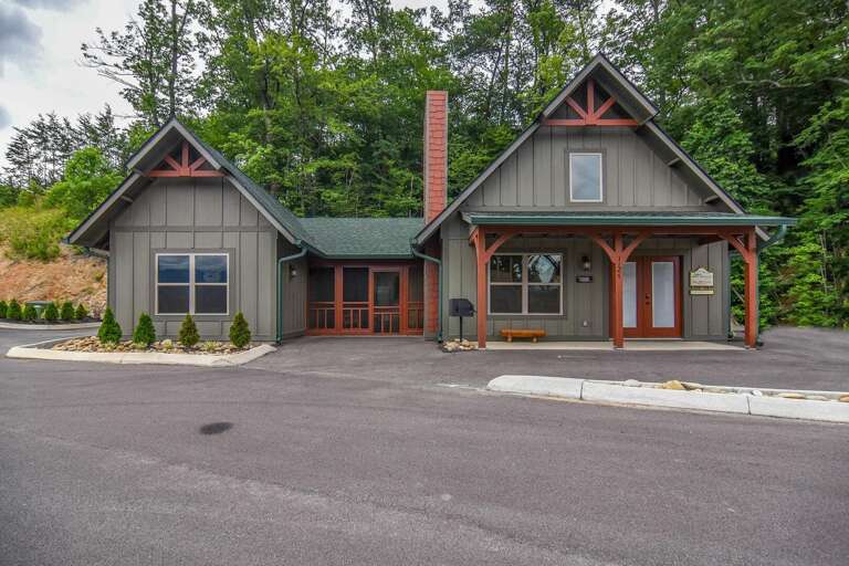 Gray Gabled Guesthouse Beside Bare Branches
