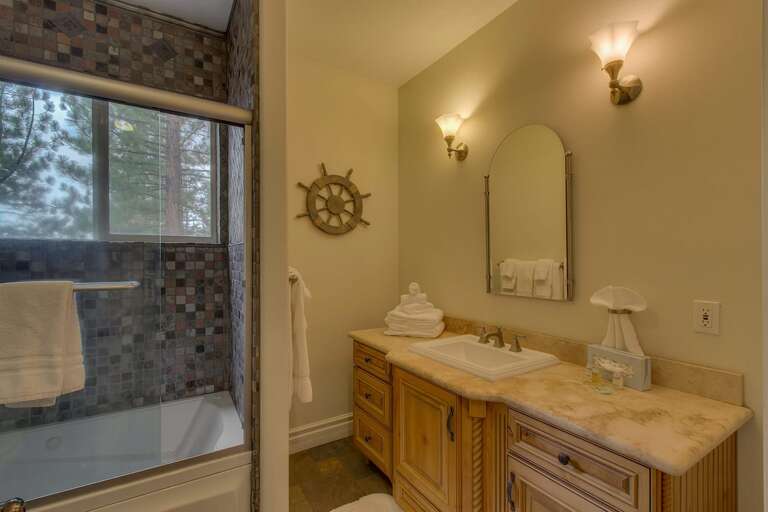 Bathroom with full bath and shower combo