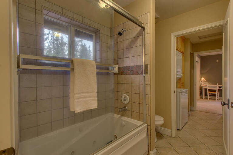 Bathroom with full bath and shower combo