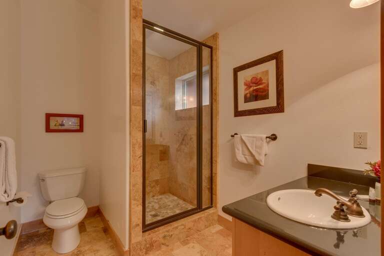 Bathroom with enclosed shower Bathroom with enclosed shower