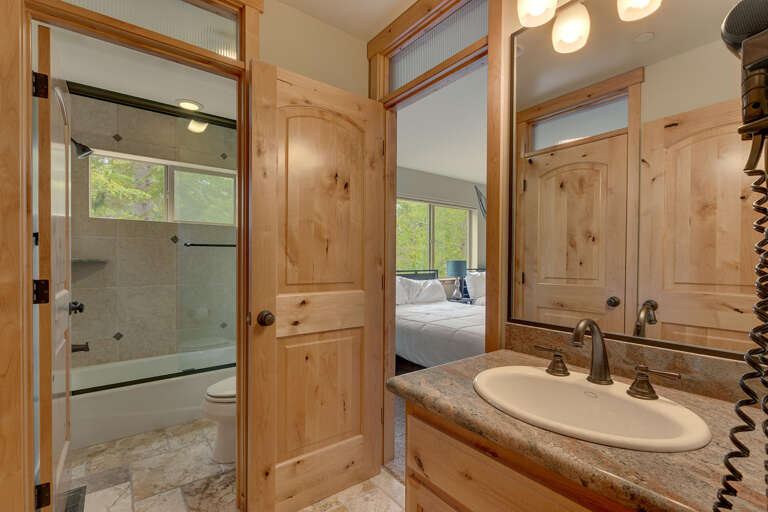 Bathroom with full bath and shower combo