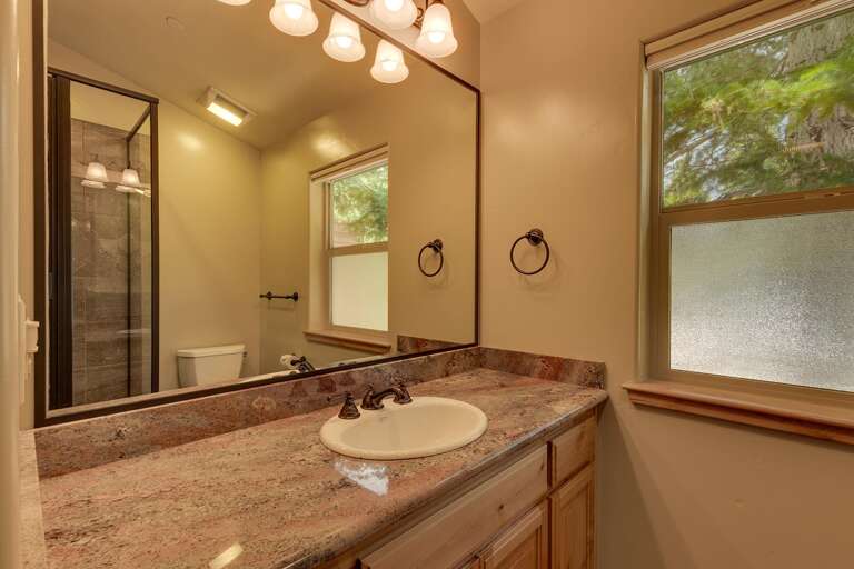 Bathroom with glass enclosed shower