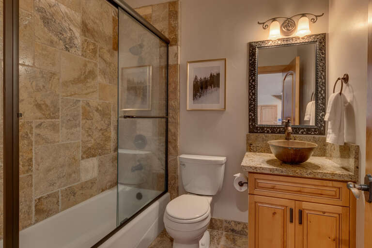 Bathroom with full bath and shower combo