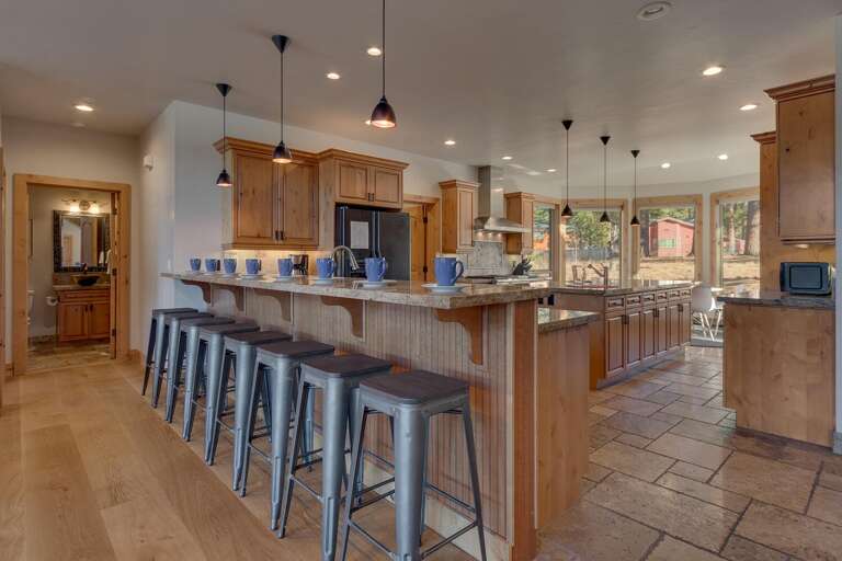 Kitchen area with stainless-steel appliances and spacious island