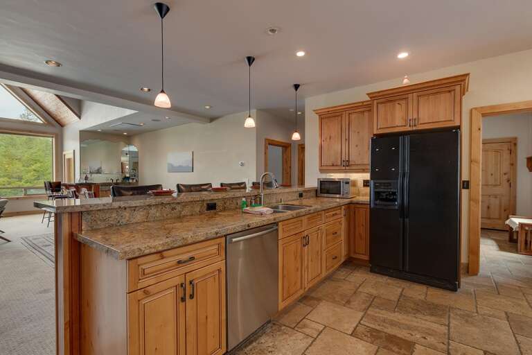 Kitchen area with stainless-steel appliances and spacious island
