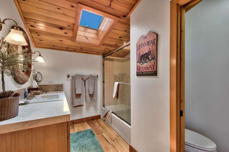 Bathroom with glass enclosed shower