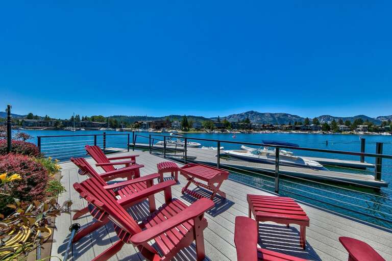Waterfront deck with outside seating and boat slip