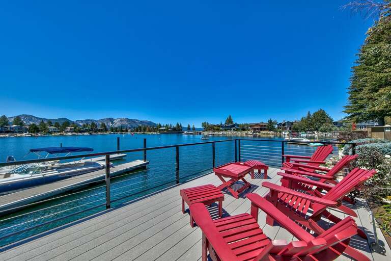 Waterfront deck with outside seating and boat slip