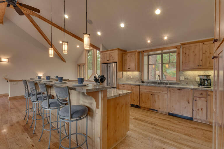 Kitchen area with stainless-steel appliances and spacious island