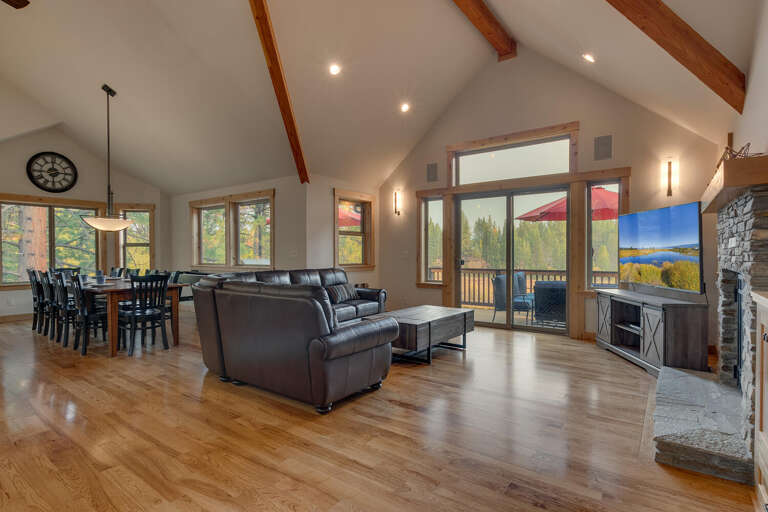 Living area with contemporary furniture, fireplace, and flat screen tv