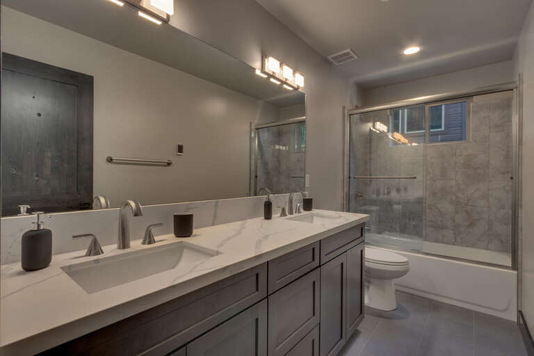 Bathroom with full shower and bath combo