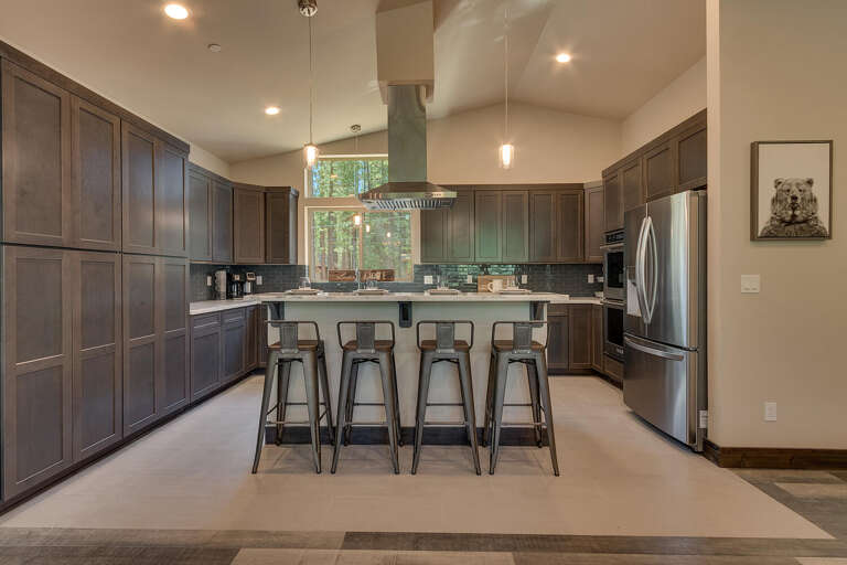 Kitchen area with stainless-steel appliances and large island