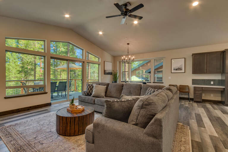 Living area with comfy sofa, fireplace, and flat screen tv