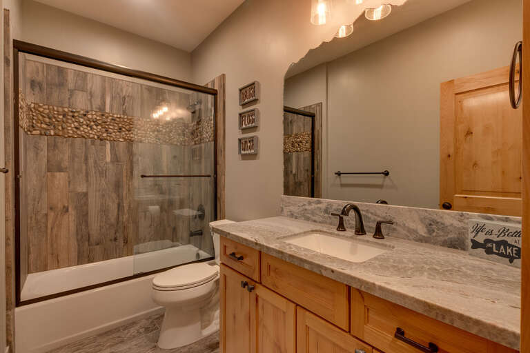 Bathroom with full bath and shower combo Bathroom with full bath and shower combo