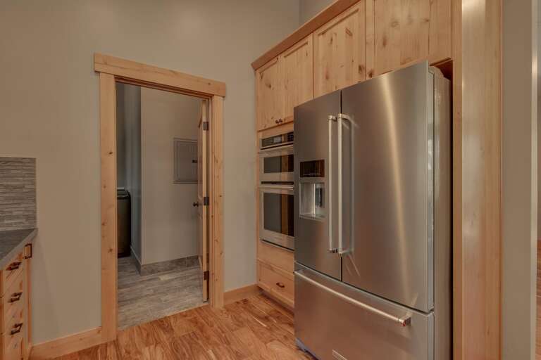Kitchen area with stainless-steel appliances Kitchen area with stainless-steel appliances