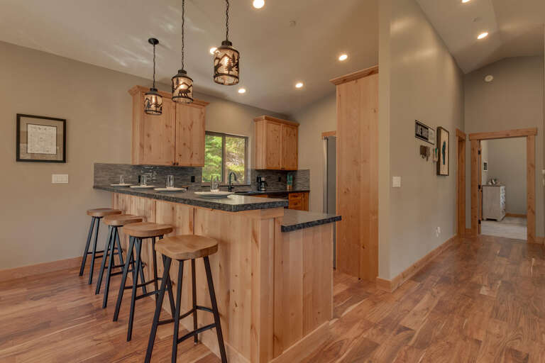 Kitchen area with stainless-steel appliances and spacious island Kitchen area with stainless-steel appliances and spacious island