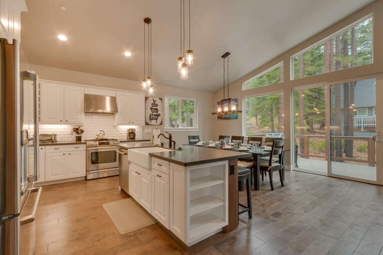 Kitchen area with stainless-steel appliances and spacious island Kitchen area with stainless-steel appliances and spacious island