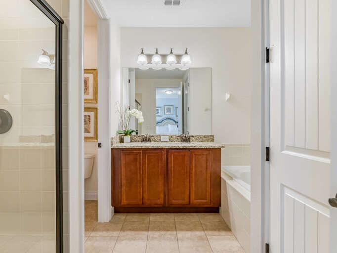 Bathroom with dual sinks, glass enclosed shower, soaker tub Bathroom with dual sinks, glass enclosed shower, soaker tub