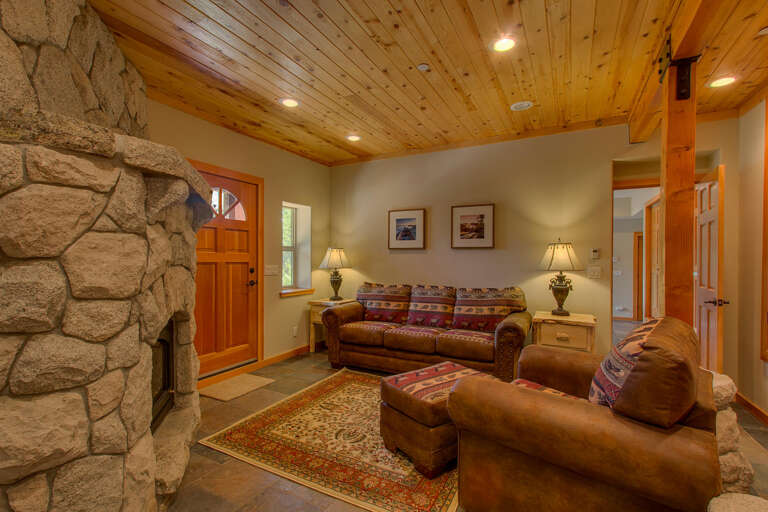 Stone fireplace and comfy couch