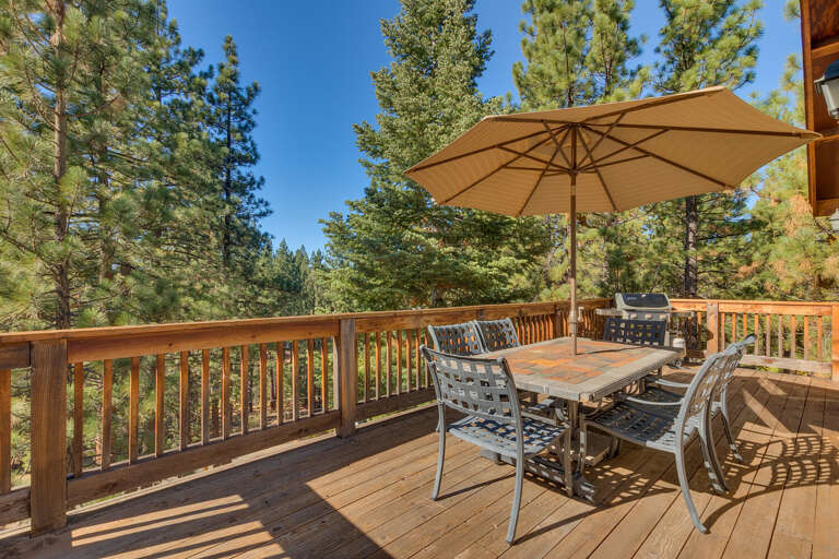 Deck with al fresco dining set up Deck with al fresco dining set up