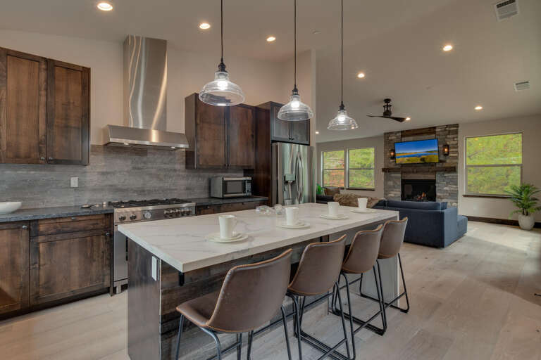 Kitchen area with stainless-steel appliances and spacious island