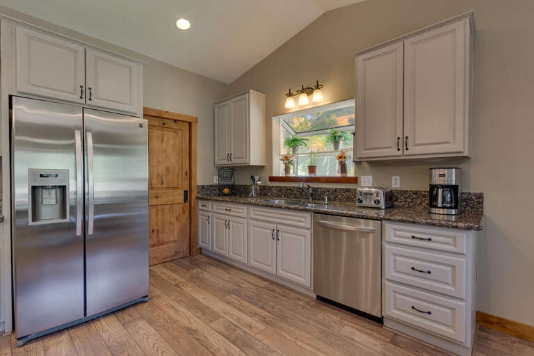 Kitchen area with stainless steel appliances