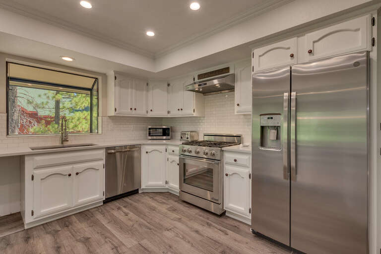 Kitchen area with stainless-steel appliances, and spacious island Kitchen area with stainless-steel appliances, and spacious island