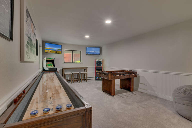 Recreation area with foosball, shuffle board, and arcades Recreation area with foosball, shuffle board, and arcades