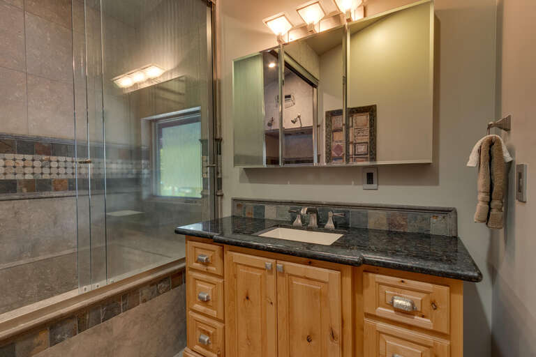 Bathroom with full bath and shower combo